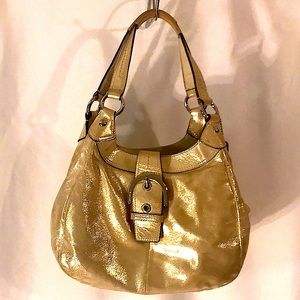 Coach metallic gold Lynn Soho leather purse.